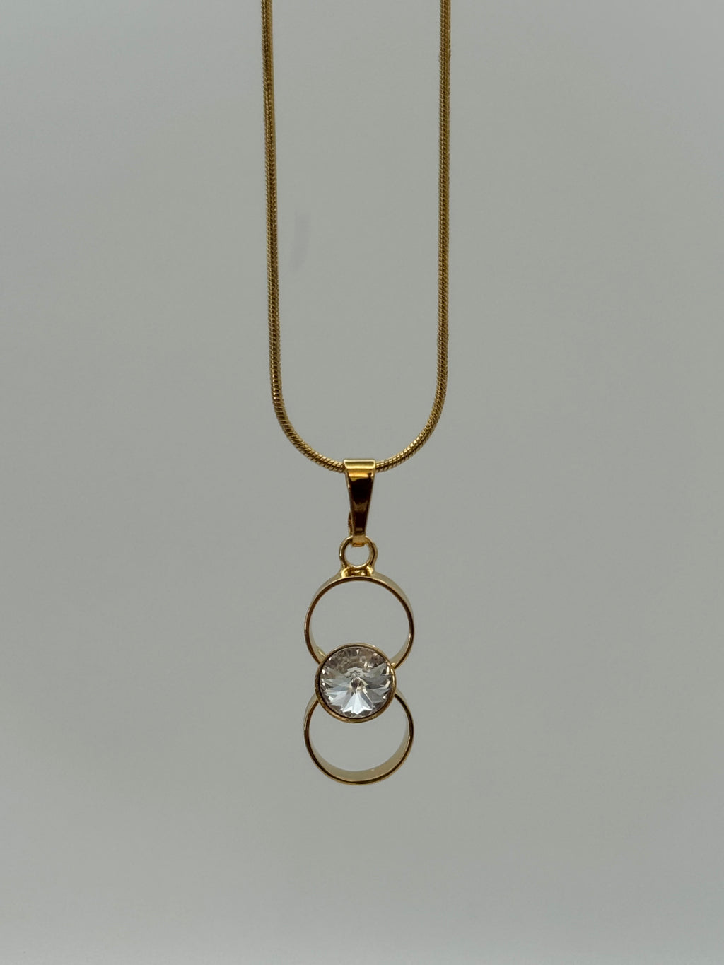 Round Stone Drop Earrings & Infinity Pendant Necklace Set