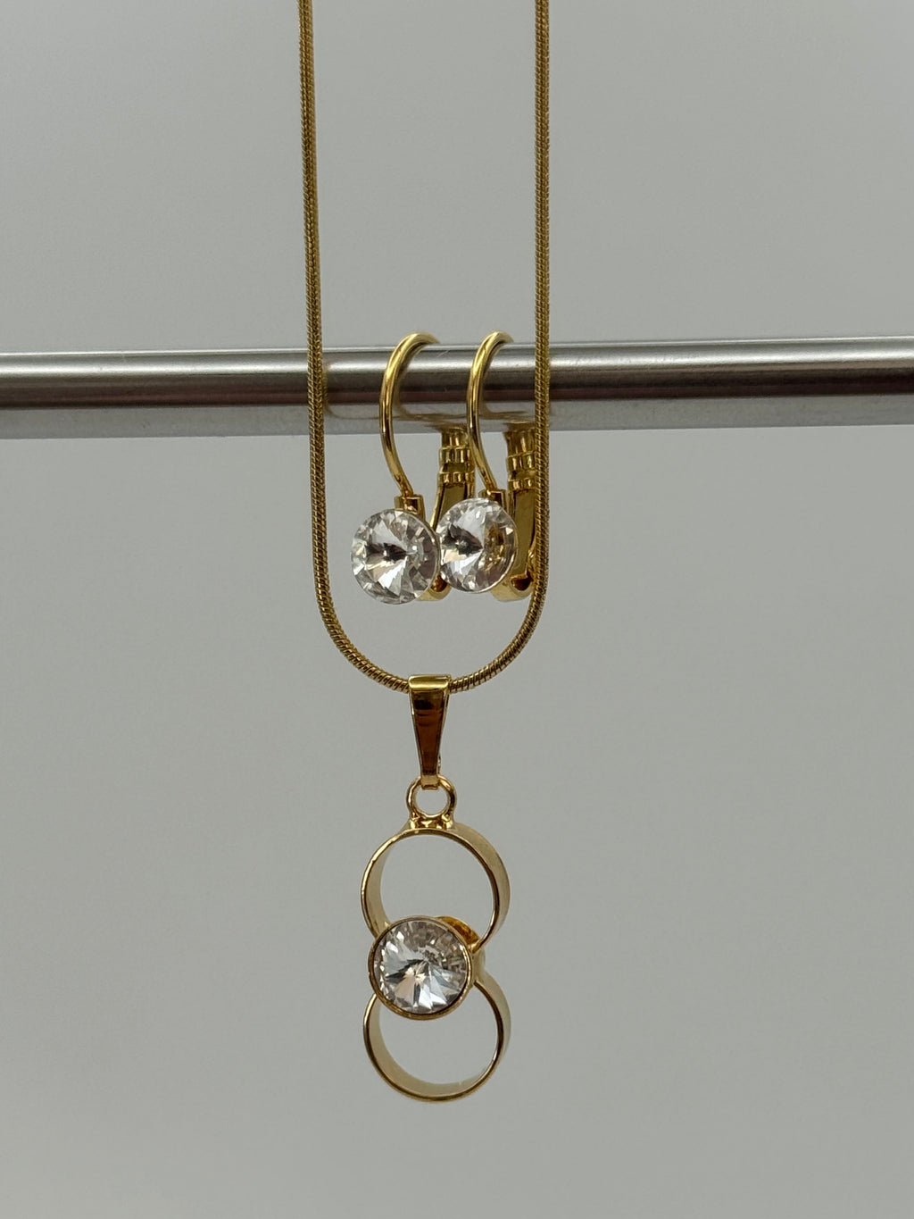Round Stone Drop Earrings & Infinity Pendant Necklace Set